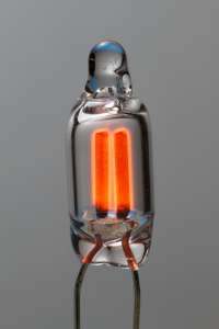Close-up of a common NE-2 like neon glow lamp, on. (click to enlarge)