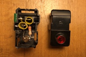 Picture of the phone ring monitor showing how it's assembled inside a plug. (click to enlarge)