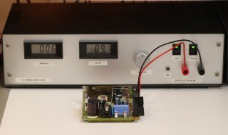 A SMPS being powered on its output by an external laboratory DC power supply to check the feedback circuit.