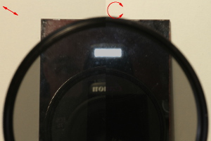 Looking at a mirror through a polarizer. Left: linear polarizer or circular polarizer with quarter wave plate towards the observer. Right: circular polarizer with quarter wave plate toward the mirror. 70 mm, f/22, 1 s, ISO-400 (click to enlarge)
